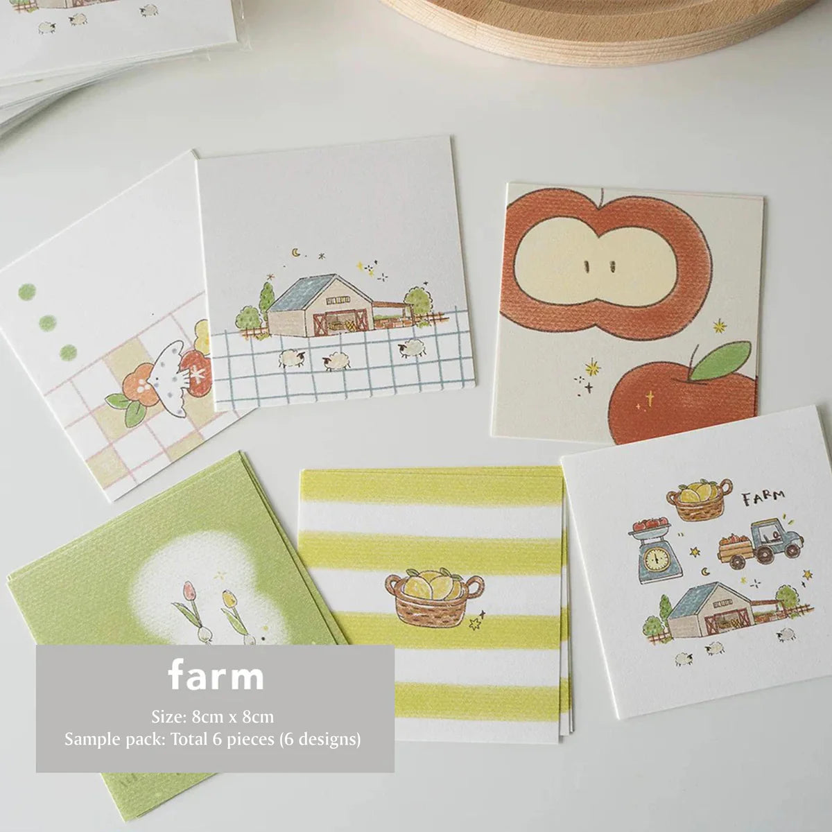 Set of six small cards with farm-themed illustrations on a white surface.