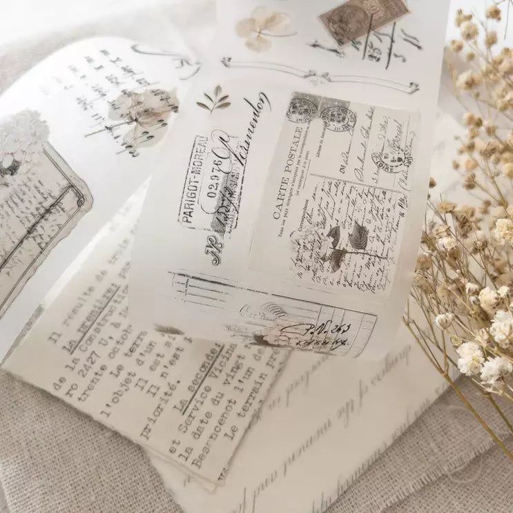 Memories Vol. 2 PET Tape vintage stamp designs styled with dried flowers alongside