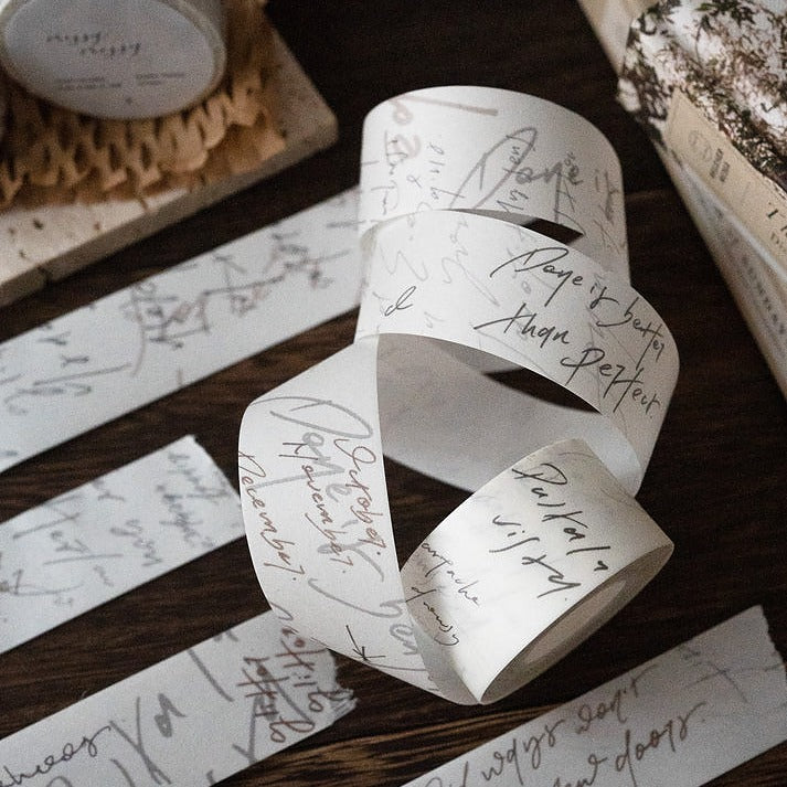 Roll of paper with handwritten text on a wooden surface