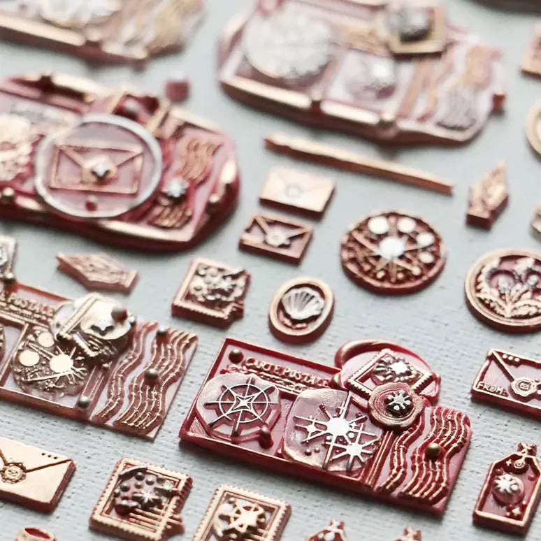 Star 10 Mini Double-Sided Wax Seal Stamp metal seal charms displayed on light blue