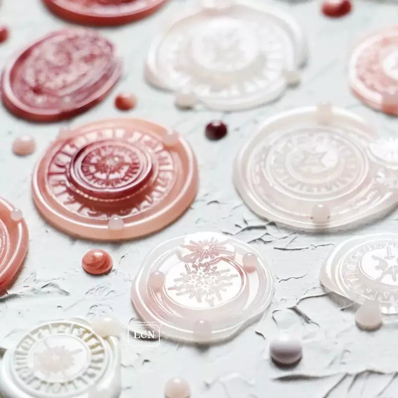 Nebula 1 wax seal stamp set with patterned sheets and brand label on white