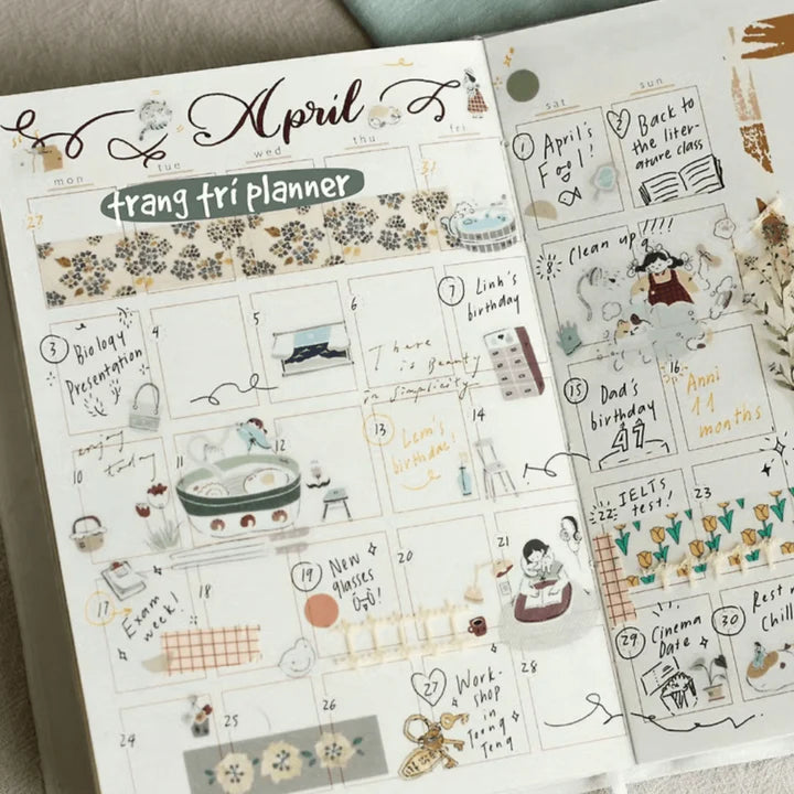 April planner spread decorated with My Home Cat PET Tape cat stickers and handwritten text