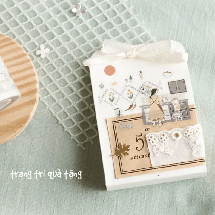 Gift packaging decorated with My Home Cat PET Tape and lace trim on a textured surface