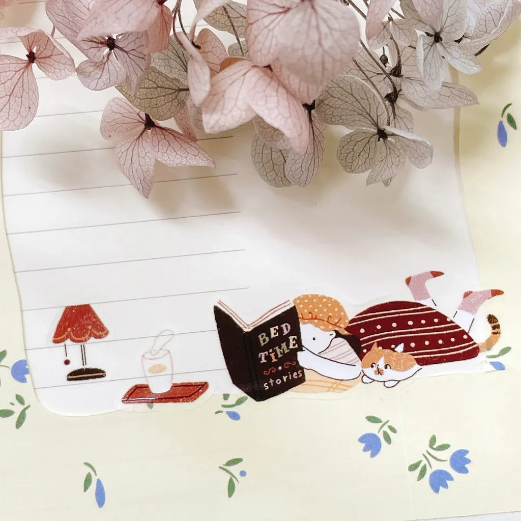 My Kitty Days PET Tape bookmark of a cat reading Bedtime Stories styled with pink flowers