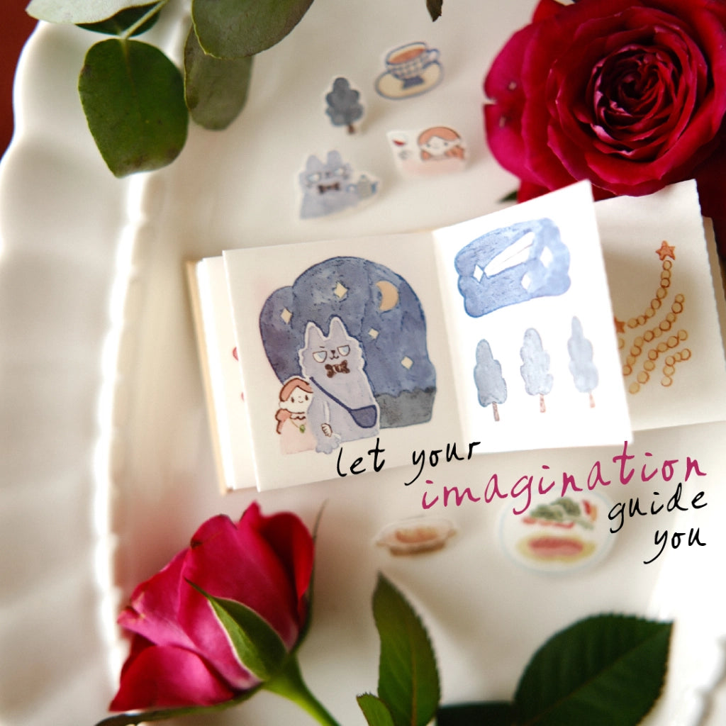 Sticker book with illustrations of a horse and trees, surrounded by roses and leaves on a white surface.