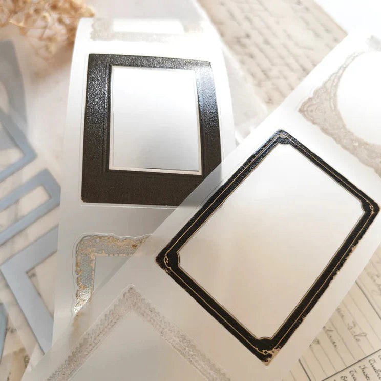 Collection of Nostalgia Frames PET Tape decorative picture frames on a textured surface