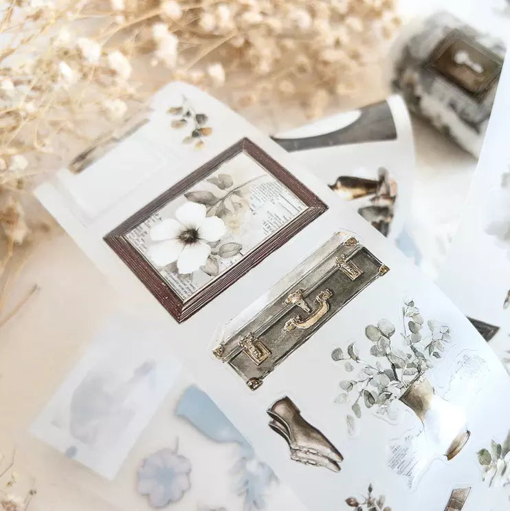 Nostalgia PET Tape floral and vintage card designs displayed on a soft blurred background