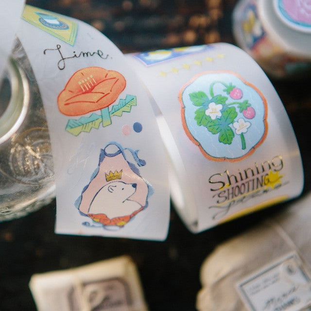 Two rolls of Bed Time Stories PET Tape with storybook designs displayed on a dark surface