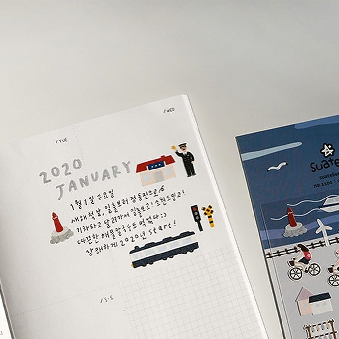 Notebook layout with traffic sign and train stickers, from the Ocean Village Sticker Sheet