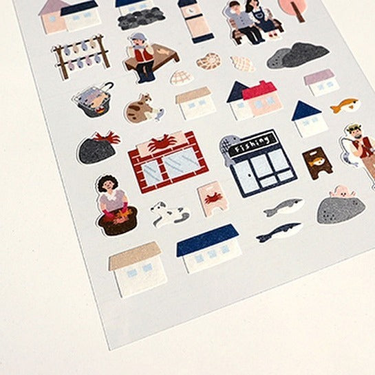 Stickers of small buildings, people and animals, from the Ocean Village Sticker Sheet