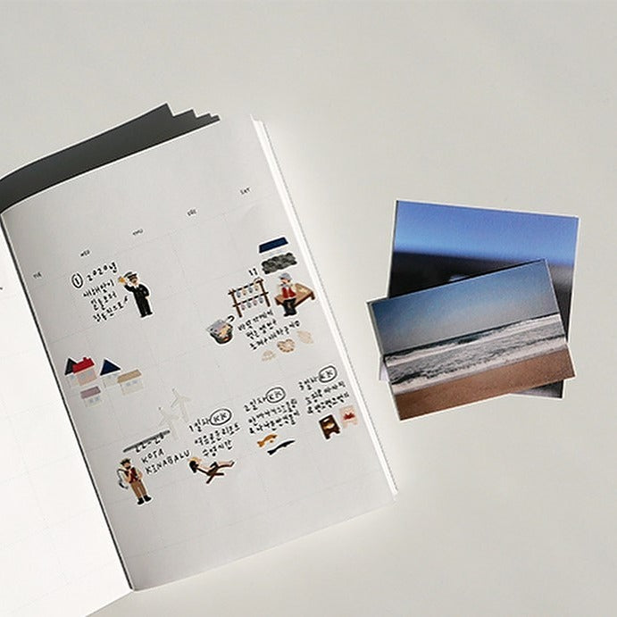 Sticker sheet with two photo prints on a light grey background, from the Ocean Village Sticker Sheet