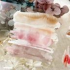 Artistic brush strokes with a floral background