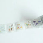 Decorative stamps with floral and text designs on a white background