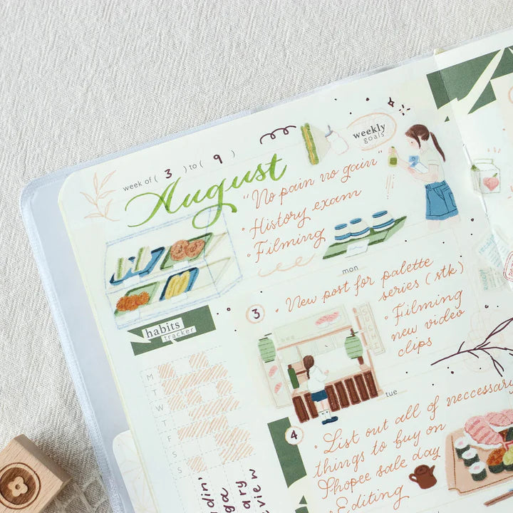 Planner spread styled with Palette Life 2 PET Tape stickers and text on a light background