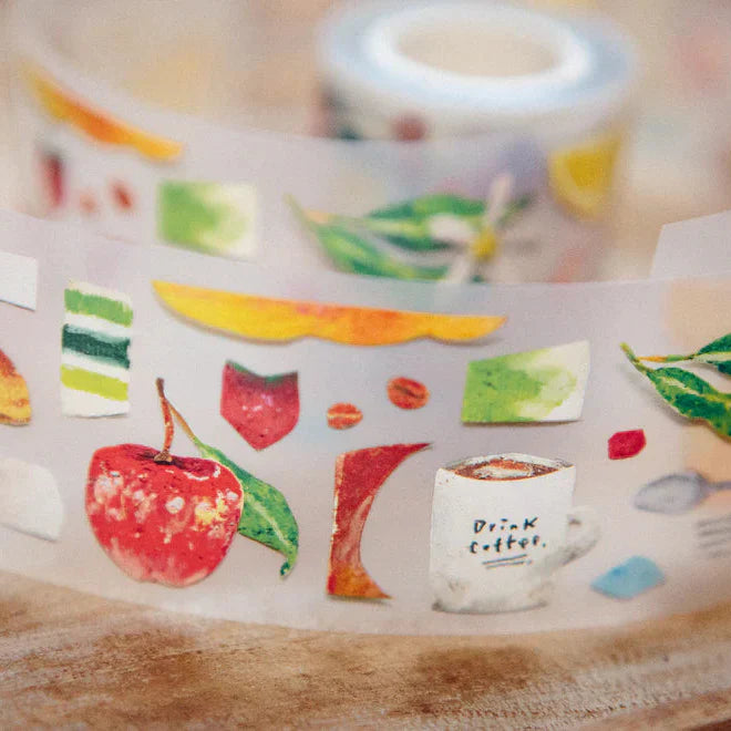Decorative tape with fruit and coffee cup designs on a wooden surface