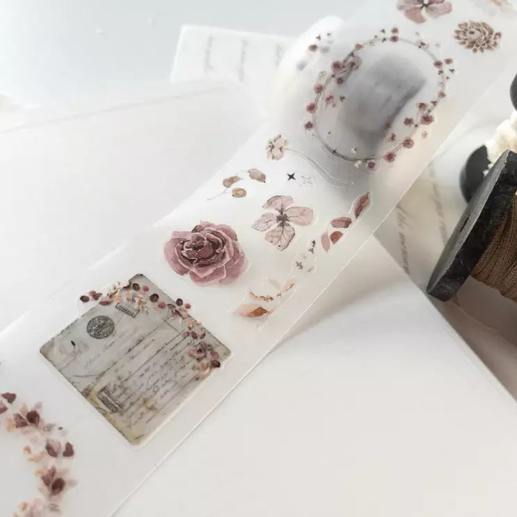 Phone case decorated with Paper Garden PET Tape floral designs on a white background