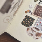 Scrapbook page with patchwork washi tape samples, floral patterns, and Japanese text in a warm brown color palette.