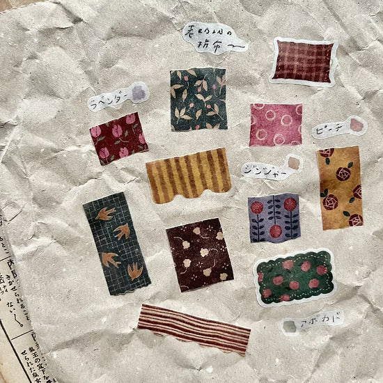Small Patchwork Die Cut Washi Tape pattern pieces arranged on crumpled paper in earthy tones