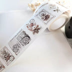 Decorative tape with vintage-style designs on a white surface