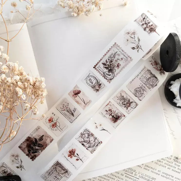 Penny Post Washi Tape florals styled with flowers and a spool of thread on white