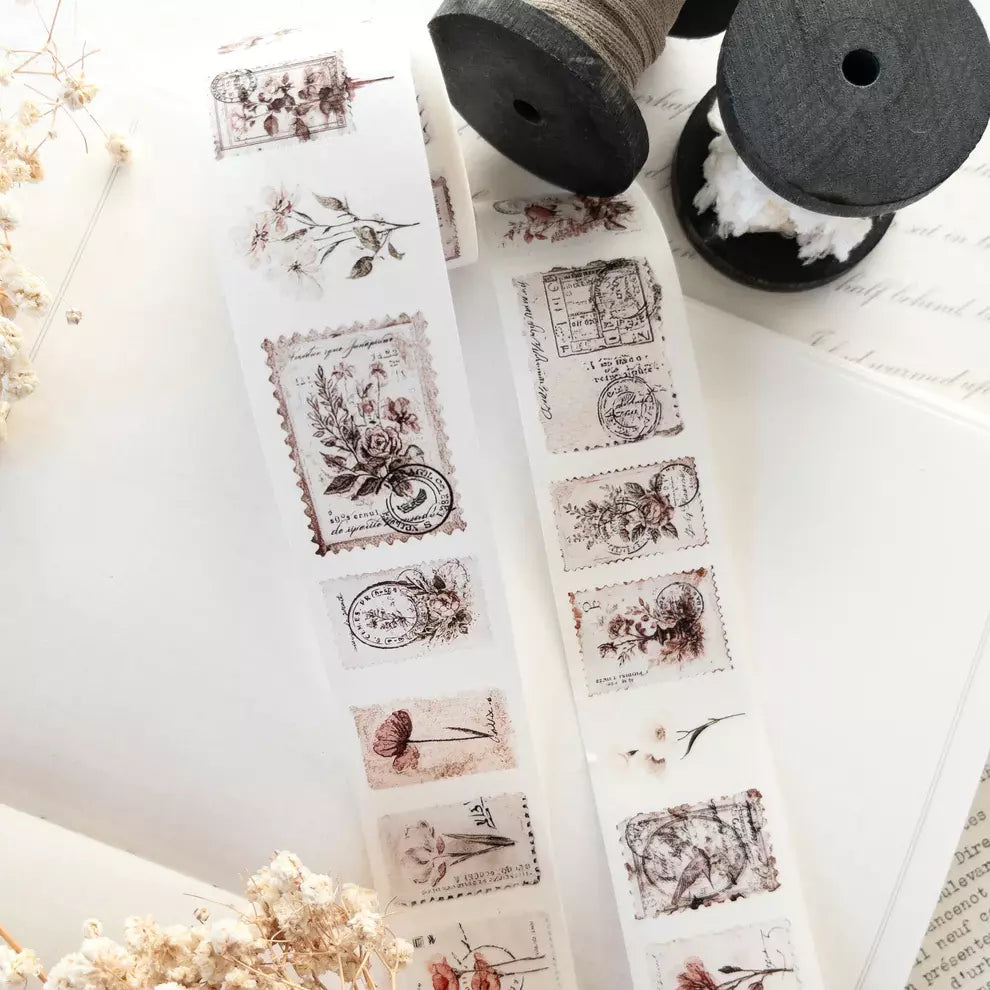 Penny Post Washi Tape vintage designs styled with wooden spools on a white surface