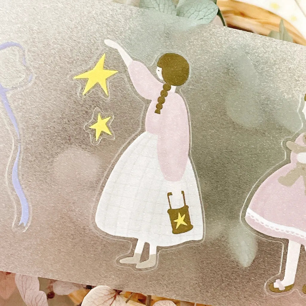 Full view of PET tape sheet with multiple pastel illustrations including girls, cats, stars, trees, and quotes.