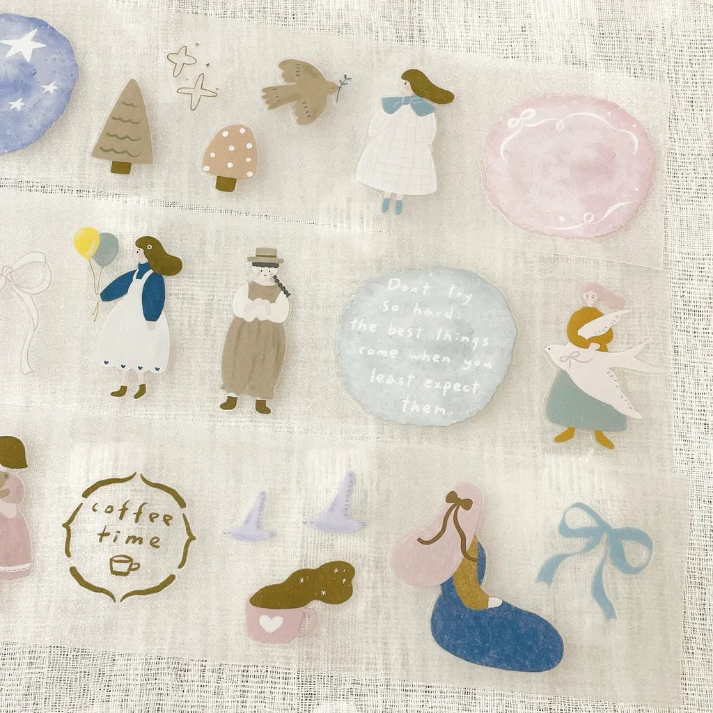 Scrapbook page decorated with blue dress girl sticker and star elements, mixed media journaling style.