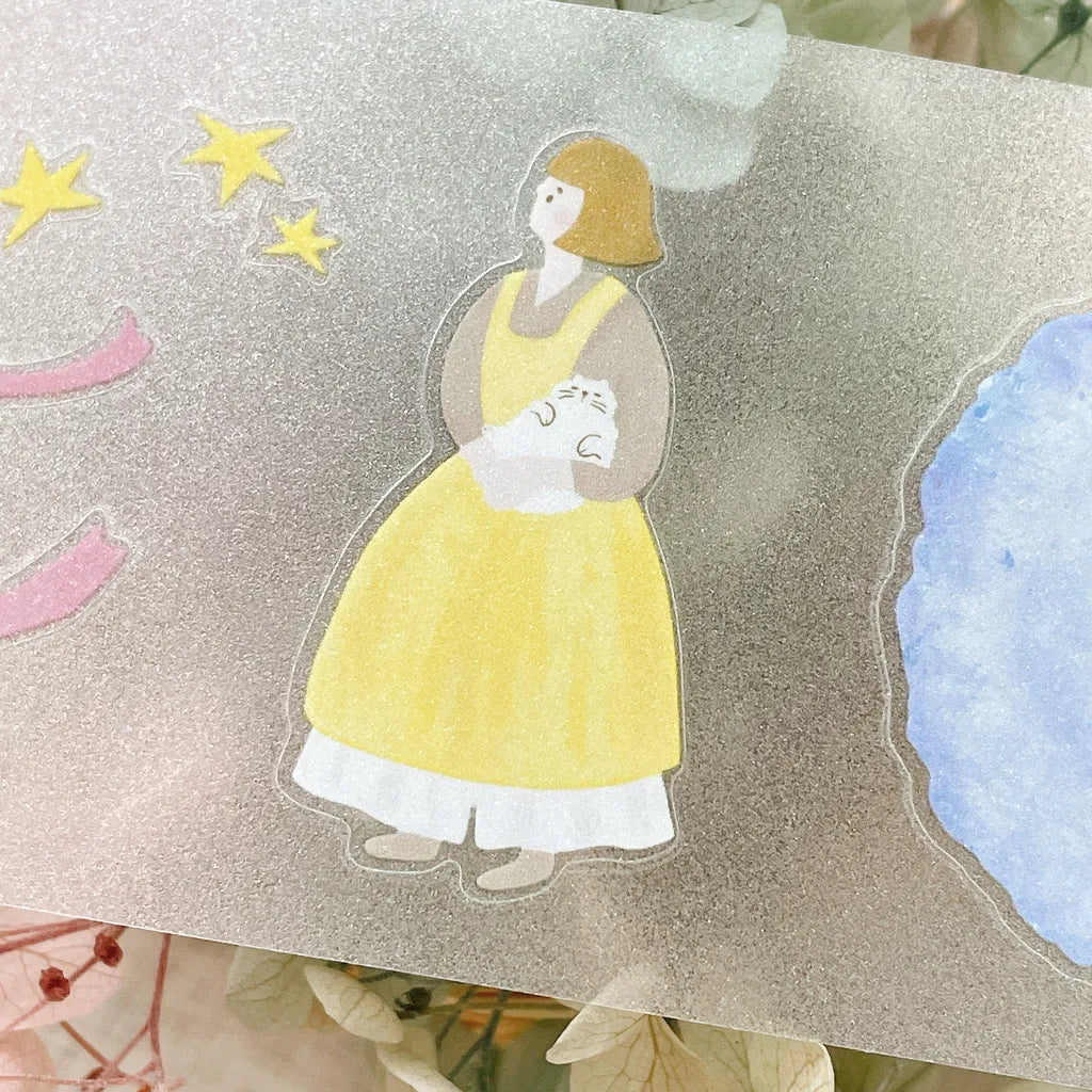 Close-up of girl holding pink flower bouquet with yarn ball and stars on aesthetic PET tape.
