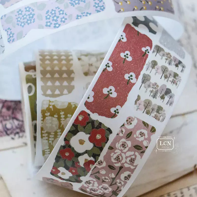 Assorted Piece of Paper PET Tape sheets with floral, geometric and alphabet designs in pastels