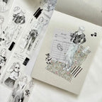 Notebook with illustrated design on a white surface