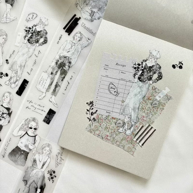 Notebook with illustrated design on a white surface
