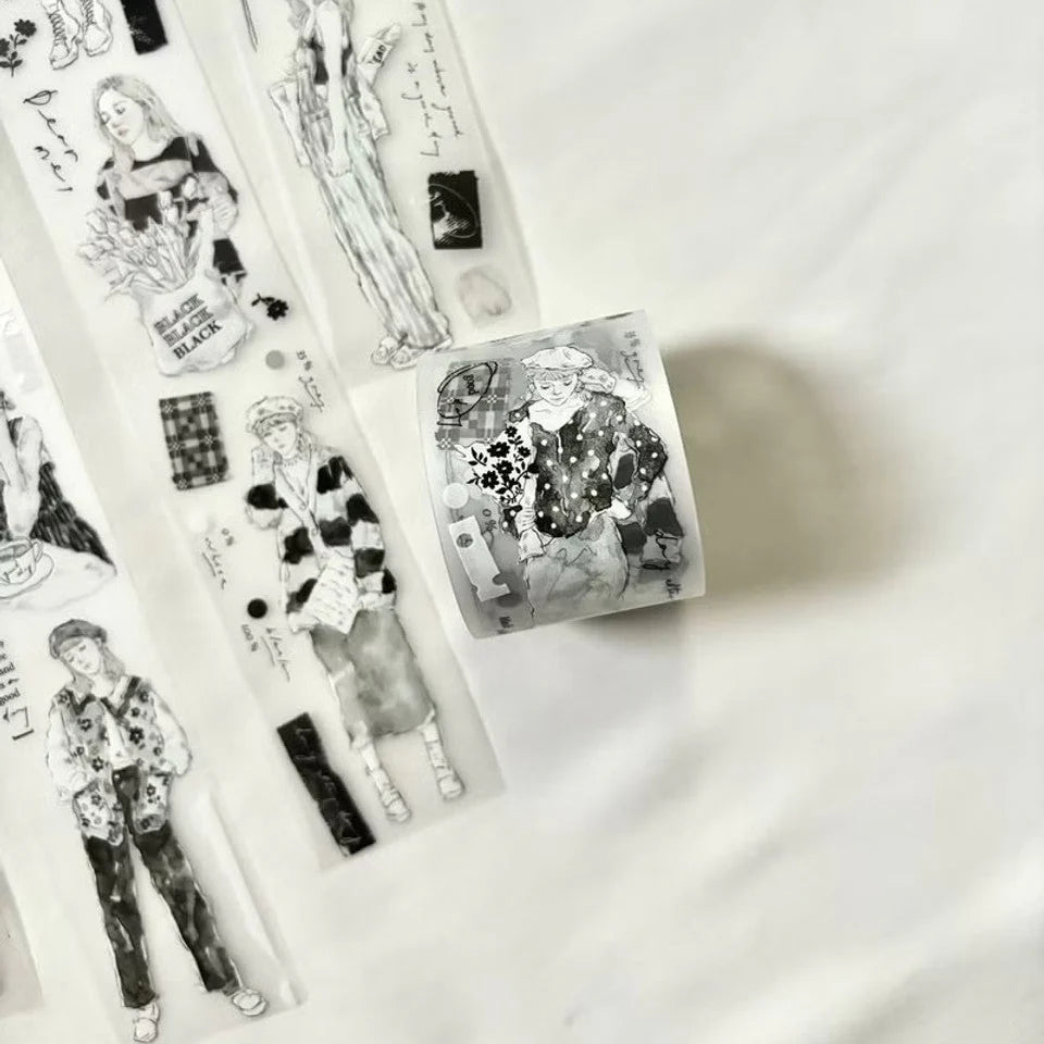 Black and white washi tape rolls with illustrations on a white background