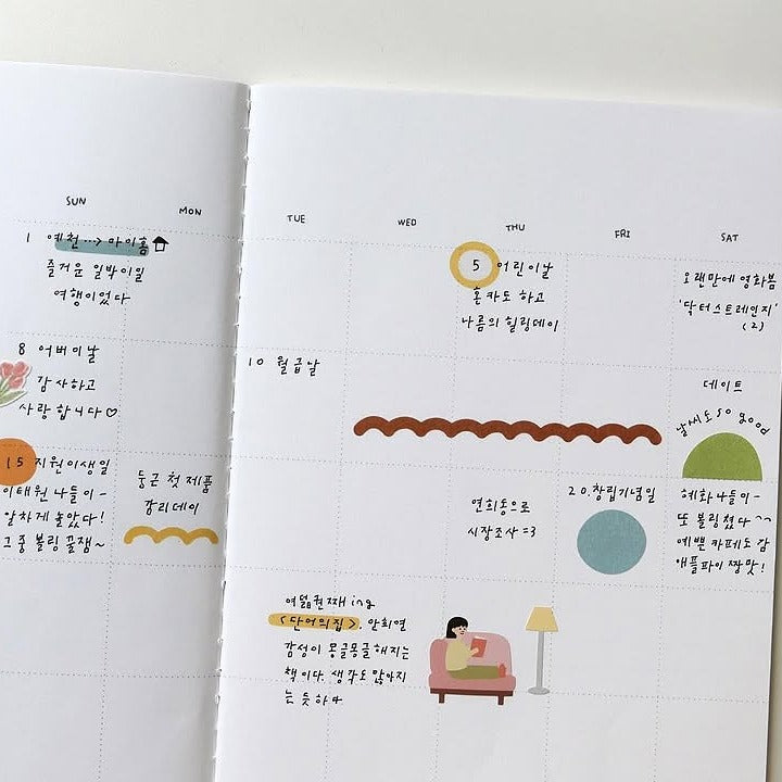 Open planner with daily schedule and illustrations on a white background