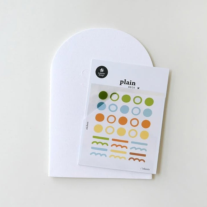 Pack of colorful circular and wavy line stickers on a white card with a plain design label.