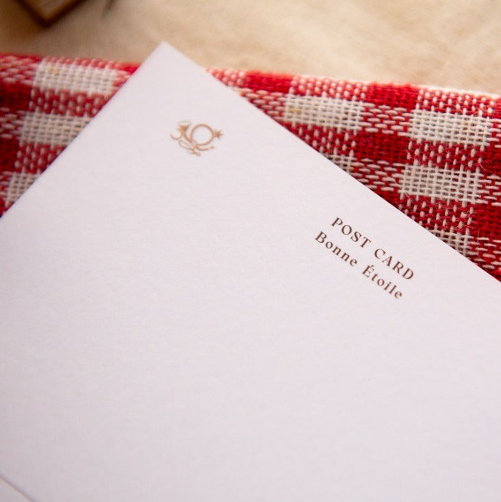 Wish Post Card by OURS Studio — 'Bonne étoile' postcard back on red checked cloth, for journaling
