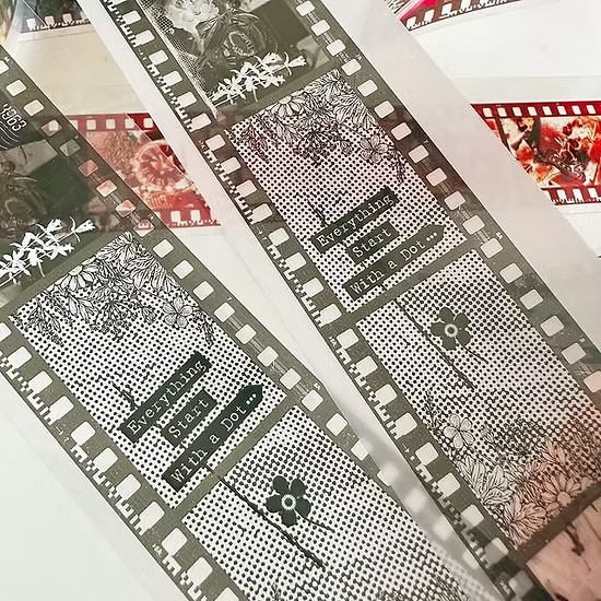 Re-Live Your Unforgettable Moments PET Tape film strip design with text on white