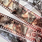 Close-up of a film strip with vintage-style images and text.
