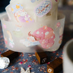 Decorative tape with cartoon designs on a wooden block