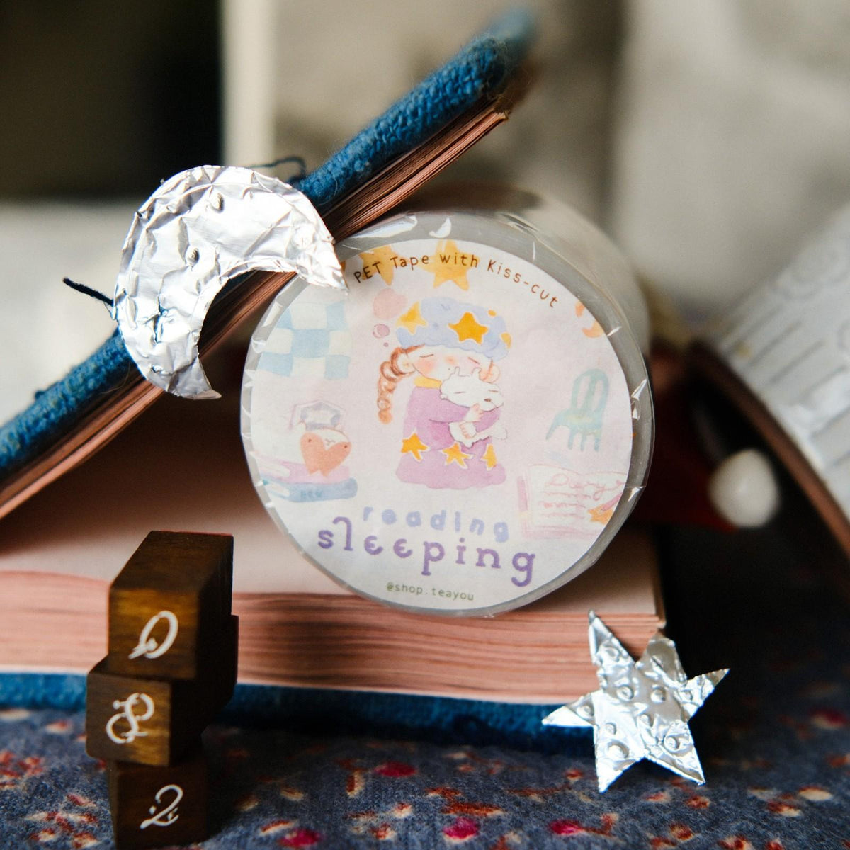 Decorative washi tape with cartoon design on a book