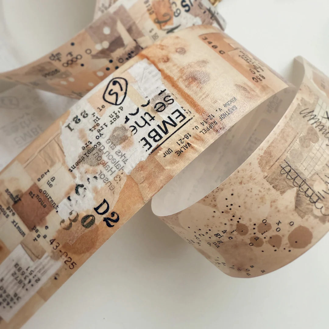 Roll of Remind Washi Tape with cork-textured embossed design on a white background