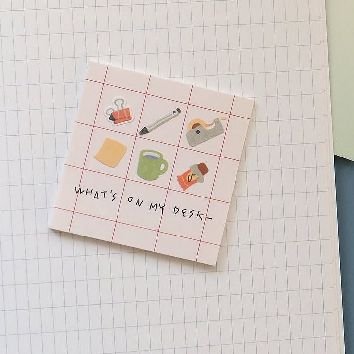 Notebook with stickers on a grid background, from the Retro Office Sticker Sheet