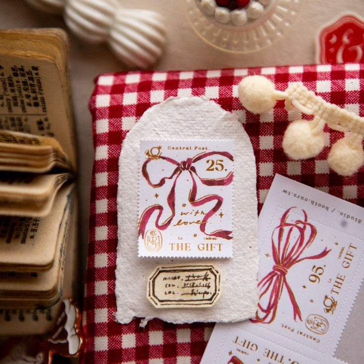 Ribbon Bow Stamp Sticker Sheet by OURS Studio — tea-bag label styled with the stickers on checked cloth, for journaling