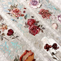Decorative paper with floral designs on a textured background