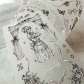 Sheet of black and white illustrations with a girl in a dress and decorative elements on a light background.
