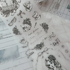 Collection of black and white illustrations and text on a textured surface
