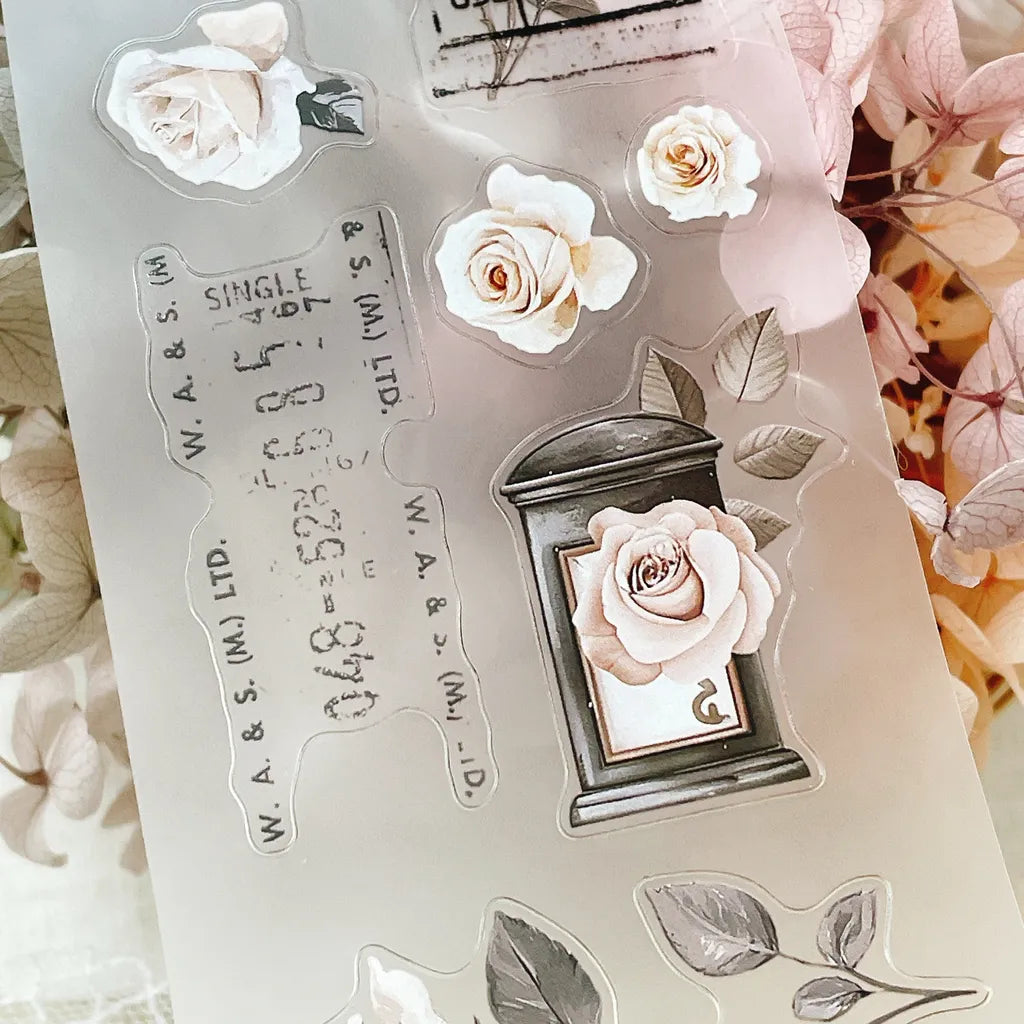 Rose Post PET Tape styled with a clear stamp set of floral elements on a textured backdrop