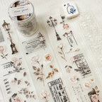 Collection of decorative stickers with floral and vintage design elements on a textured surface.