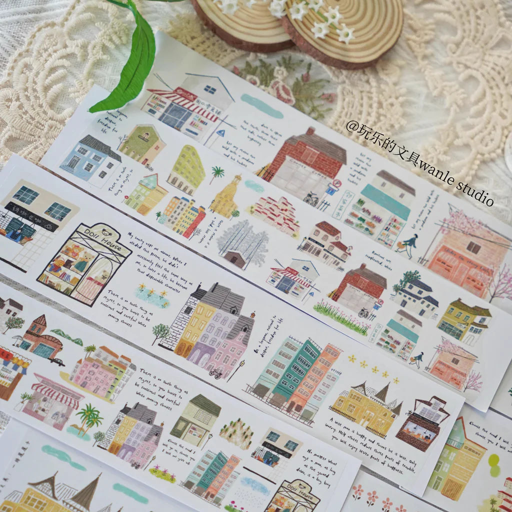 Set of Row of Houses Washi Tape house sticker designs on a textured branded surface