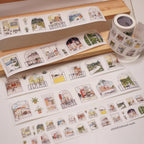 Decorative sticker sheets with illustrated scenes on a wooden surface.