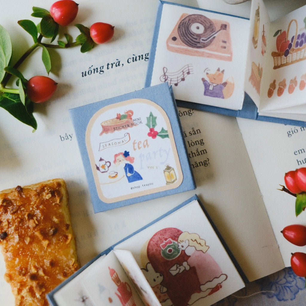 Illustrated tea packaging with decorative elements on a surface